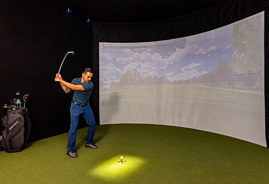 A person playing virtual golf